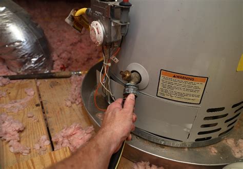 can you convert gas hot water heater to electric